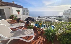 Penthouse con piscina y vistas al mar